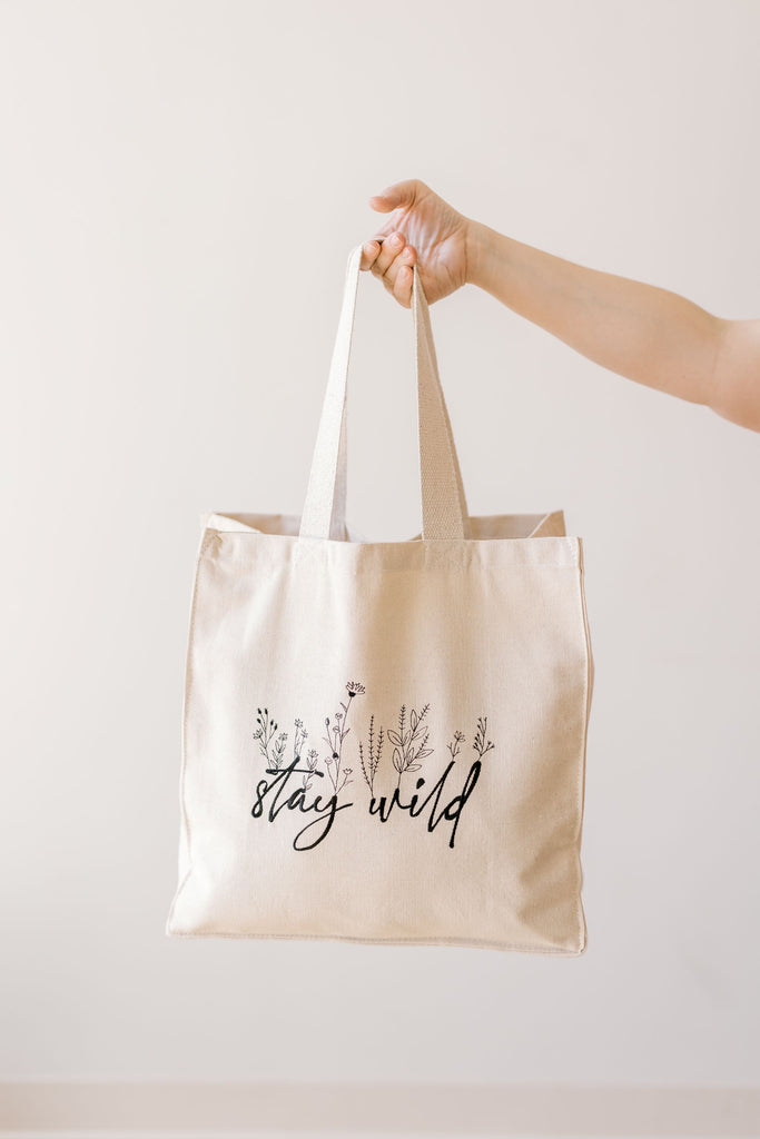 Stay Wild Tote Bag Holding